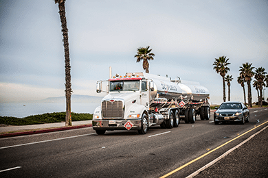 Truck delivering branded wholesale fuel